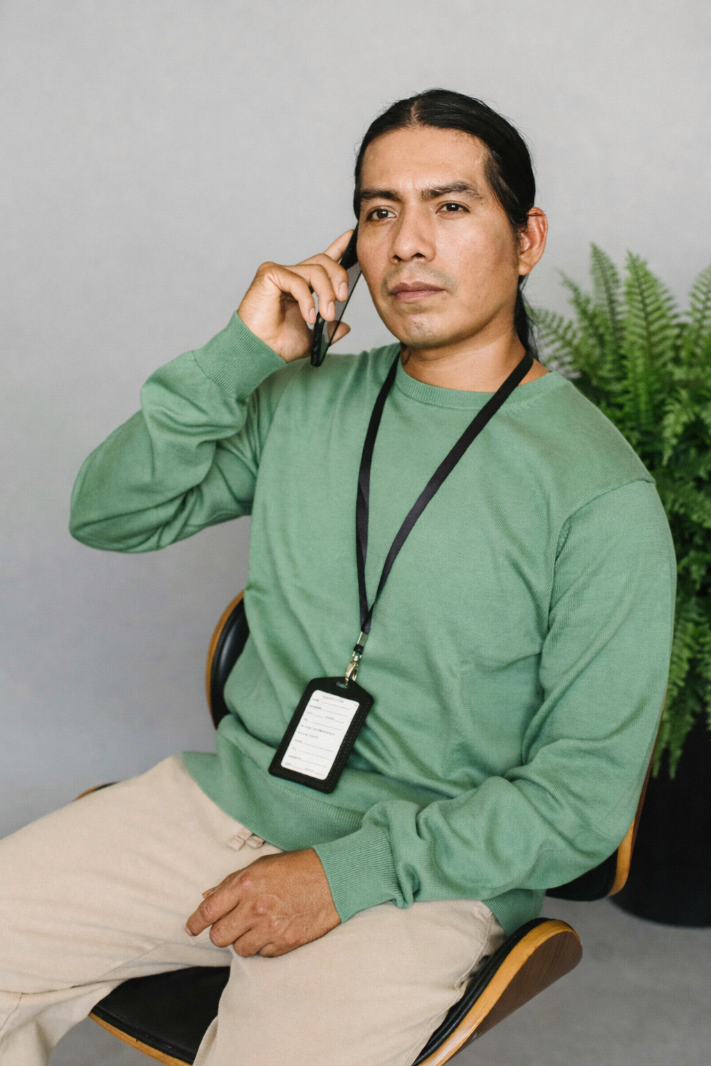 Attendee with name badge on a call